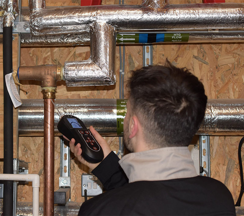 Portable leak detector being used in the field